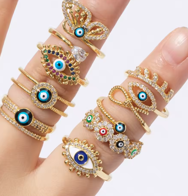 خاتم نسائي فاخر من الفولاذ المقاوم للصدأ مطلي بالذهب – تصميم هندسي بعين الشر وقابل للتعديل